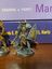 miniaturas de heróis e vilões