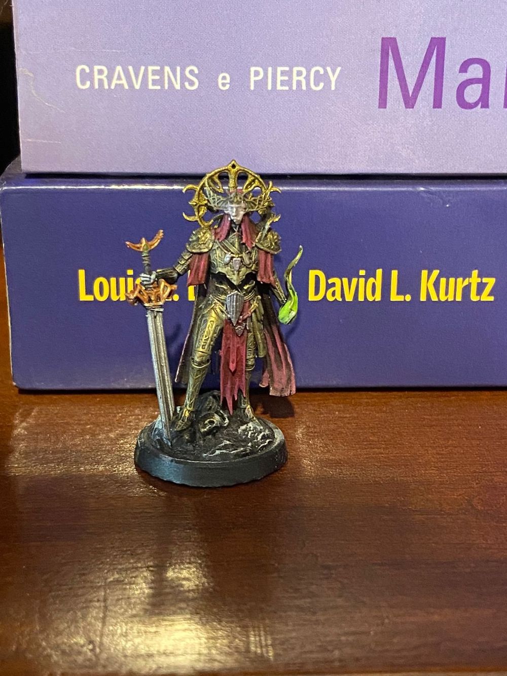 miniaturas de heróis e vilões
